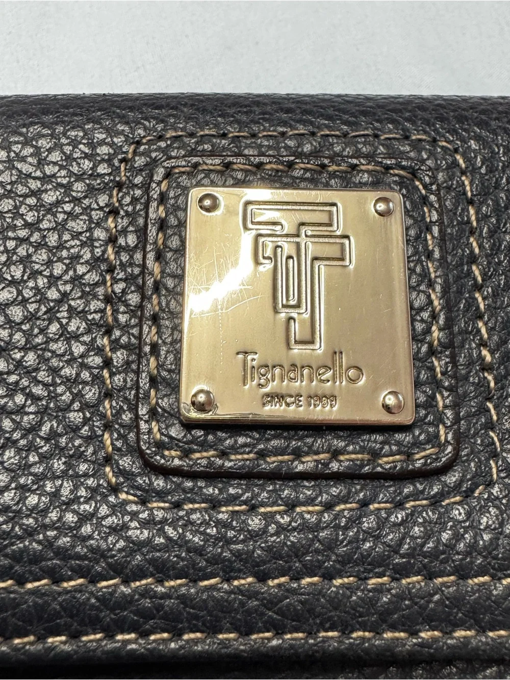 Tignanello Navy Pebbled Leather Wallet with Metal Logo Plaque